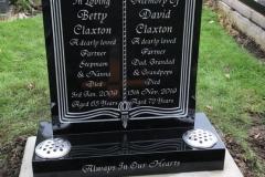 Black granite open book headstone — Always In Our Hearts